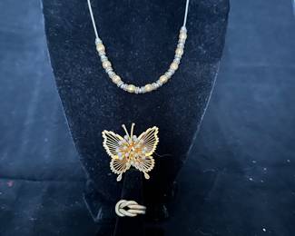 Beautiful Monet Gold and Faux Pearl Butterfly Broach Shown with Additional Jewelry.