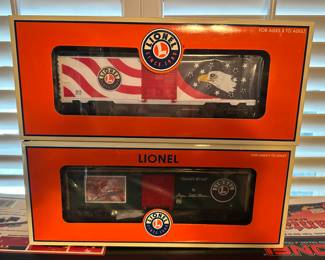 Still More Brand New Lionel Train Pieces Including 6-52309 Patriotic Unibody Tank Car 0 Gauge and Lionel 6-25011 Angela Trotta Thomas Santa's Break Christmas Holiday Box Car.