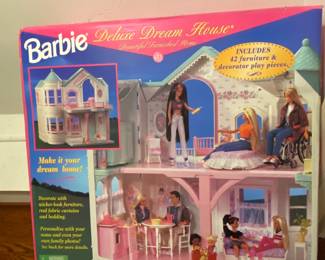 Barbie will never tire!  This is a Vintage New in Box Barbie Deluxe Dream House Model 18638.