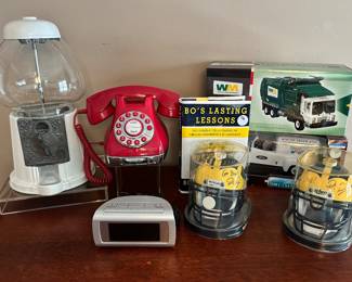 Fun Collectibles and Home Decor Including a 14.5" Vintage Gum Ball Machine, Electric "Metro Phone" in Red, Sharper Image Model 4511 Clock and More! 