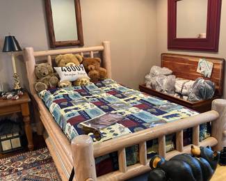 Beautiful Rustic Log Cabin-Style Twin Trundle Bed by American Indoors Log Furniture Designs in Cedar, 47" x 32"H x 84" with Teddy Bears and a 48009 Zip Code Pillow.