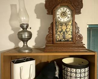 Vintage lamp and antique Welch clock, shelf, purse, antique alpine style hat and hat box