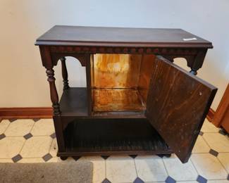 #17	Antique Cabinet w/center Door w/metal inside w/bottom Shelf - (small pie safe) - 24x11x24 - Some Wear on top	 $75.00 
