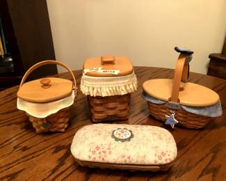 #103	Set of 4 Longaberger Baskets w/Lids w/inserts	 $25.00 
