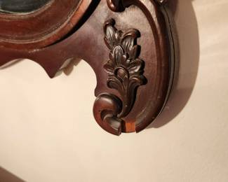 #48	Wood Framed Oval Top Carved Mirror - 29x45 - small crack in Frame	 $75.00 

