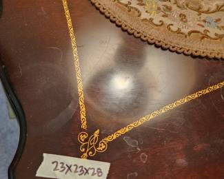 #3	Antique Dark Wood Double Shelf End Table on pedestal Leg - 23x23x28 (few watermarks) w/gold Decal on top	 $225.00 
