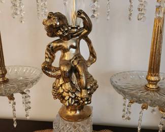 #5	Scales of Justice Crystal/Brass Base w/Cherub sitting on Fruit - 22Wx24T	 $175.00 
