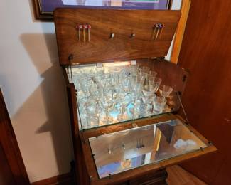 #72	G & F Gold Feather Products Antique Burl Wood Drop Front ,lift-top Cabinet lighted w/2 wood Doors & 1 curved Shelf - 29x15 47T	 $275.00 