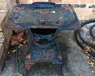 #135	Rusty Cast Iron Stove by Bon - 19x13x21	 $65.00 
