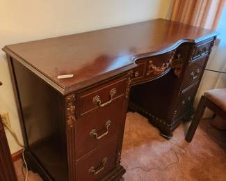 #46	Antique Wood Carved Curved Front Desk w/7 drawers w/hand-dovetailing on Drawers (one handle needs repair but present) - 50x19x31	 $275.00 
