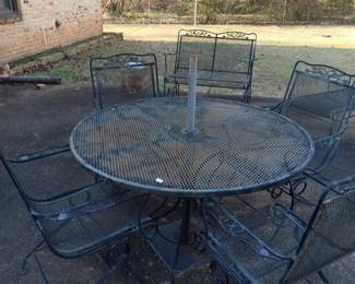 #130	Black Wrought Iron Table w/4 bouncy Chairs Patio Set - 48"Round	 $100.00 
