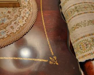 #3	Antique Dark Wood Double Shelf End Table on pedestal Leg - 23x23x28 (few watermarks) w/gold Decal on top	 $225.00 
