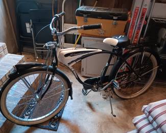 #125	Schwinn Deluxe 7 Phantom Cruiser Bicycle	 $650.00 
