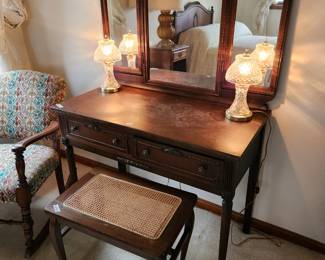 #37	Vintage Wood Carved Vanity w/triple Mirror - Dovetailed w/2 drawers - 37x19x29  Mirror 38x26 w/wood Stool w/cane top(not matching) - 22x14x18	 $175.00 
