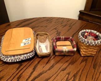 #116	Longaberger set of 4 baskets (one with wood top) w/inserts and liners 	 $35.00 

