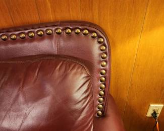 #55	Burgundy Pleather Sofa w/brass nail head Trim - 88x37x36" Long (one small tear)	 $300.00 
