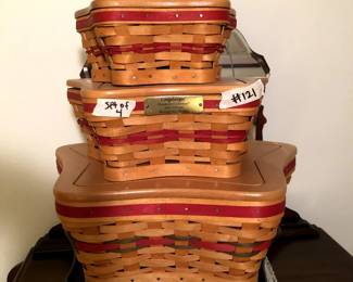 #121	Longaberger Christmas Collection on a Stand w/wood Top w/liners and inserts - set of 4 star shaped	 $60.00 
