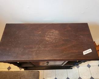 #17	Antique Cabinet w/center Door w/metal inside w/bottom Shelf - (small pie safe) - 24x11x24 - Some Wear on top	 $75.00 
