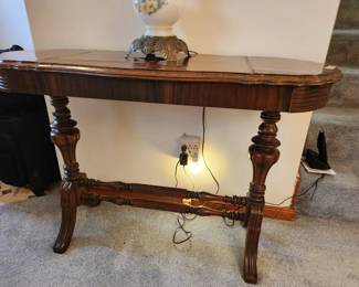 #18	Wood Oval Sofa Table w/double pedestal Legs - 42x18x29 - Top Veneer Buckled - as pictured	 $35.00 

