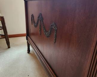 #33	Antique Wood Headboard w/carvings in Center and top w/rounded Wood Footboard w/Cream Spread and Orto Pedic Supreme Mattress/Boxsprings (still in plastic) & 2 plastic covered pillows)	 $300.00 
