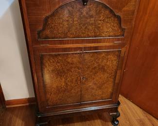 #72	G & F Gold Feather Products Antique Burl Wood Drop Front ,lift-top Cabinet lighted w/2 wood Doors & 1 curved Shelf - 29x15 47T	 $275.00 
