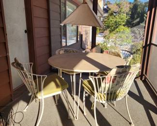 Woodward style Mid-century patio set. It has 6 chairs