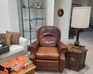 Leather recliner, octagonal table, retail display case