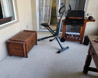 Grill, outdoor storage, exercise bike