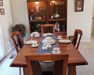 Dining table with four matching dining chairs