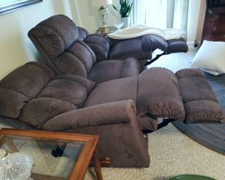The sofa's recliners fully reclined