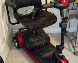 Go Go 'Elite Traveler' scooter with charger (has new batteries)