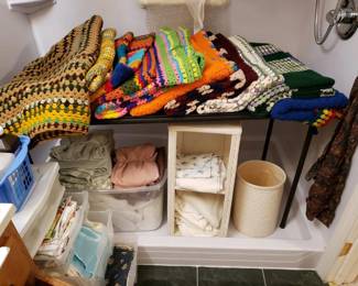 Many more locally chrocheted afghans