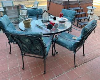 Outdoor patio set with five chairs and Lazy Susan