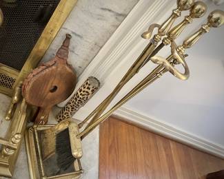 Brass fireplace bumper, andirons, and tools