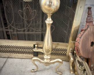 Brass fireplace bumper, andirons, and tools