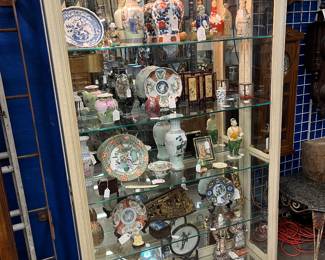 Cabinet Full of Asian Antiques