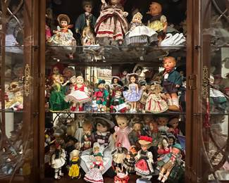 Extensive doll collection.  Madam Alexander, antique, and foreign dolls.