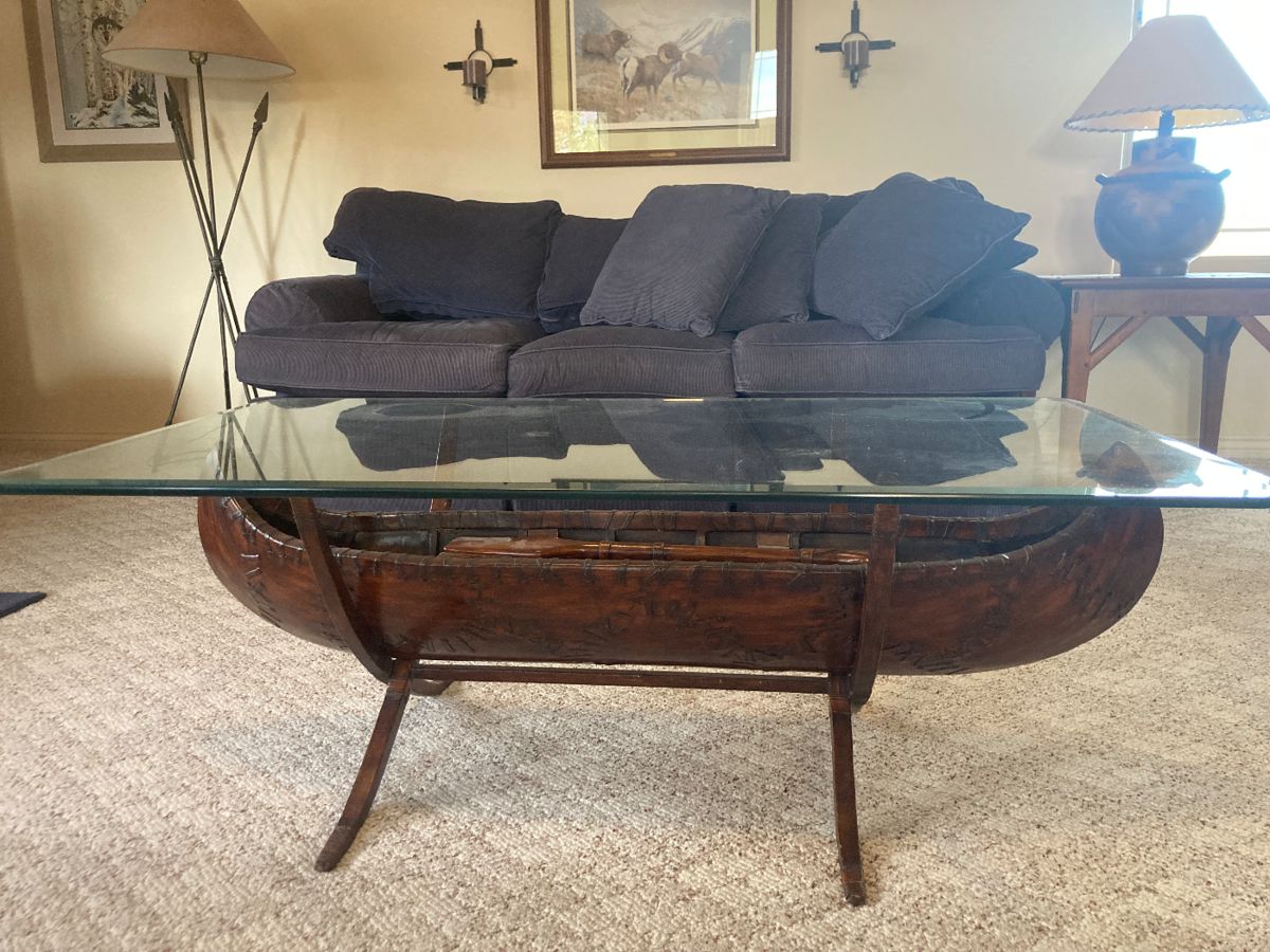 Unique carved canoe coffee table 