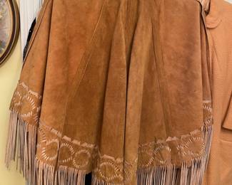Leather pancho with tassles