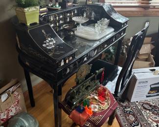 Black laquer panted and semiprecious stone and mother of pearl inlay desk