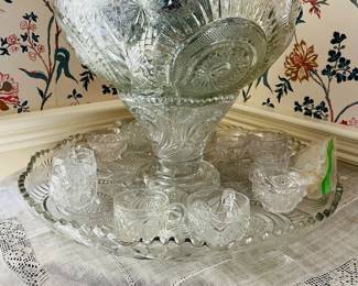 Fabulous punch bowl with pedastal, platter, and cups.