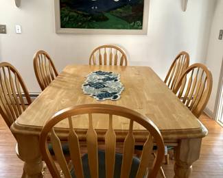 Everyday kitchen table with six chairs - cushions will be thrown in if desired by buyer.