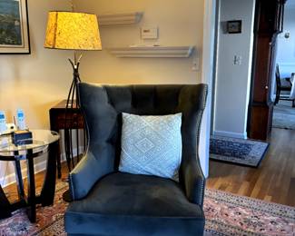 Upholstered wing back chair.