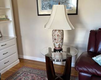 Asian painted lamp. Also pictured, one of two glass endtables with a matching oval coffee table (not pictured) and one of two Maxwell Mays framed New England prints.