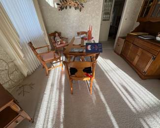 . . .  drop leaf table and chairs