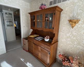 . . . nice warm-colored china hutch filled with treasures!
