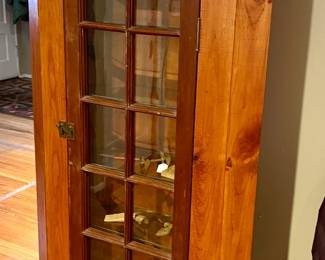 Glass front corner cabinet