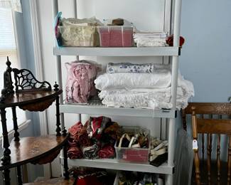 Antique embroidered linens, fabric pieces, quilts