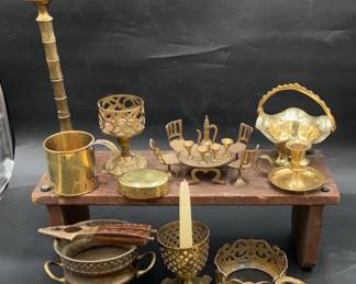 brass decorations including candle holders, basket, egg, nesting bowls, vintage brass doll house table 4 chairs, 4 cups and coffee pot