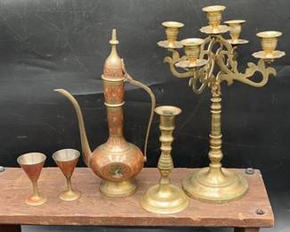 Vintage pitcher etched engraved with two small goblets.
Candelabra and candlestick